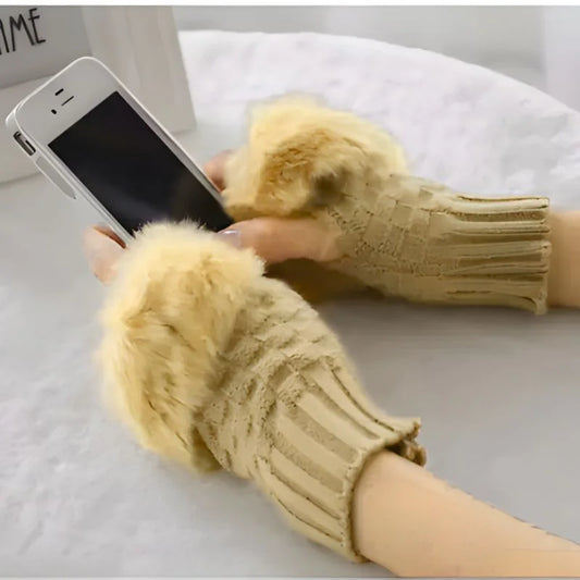 Hunt PK Beige fingerless gloves being worn on a white surface with a phone.