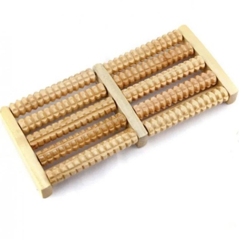 Wooden foot roller massager on a white background