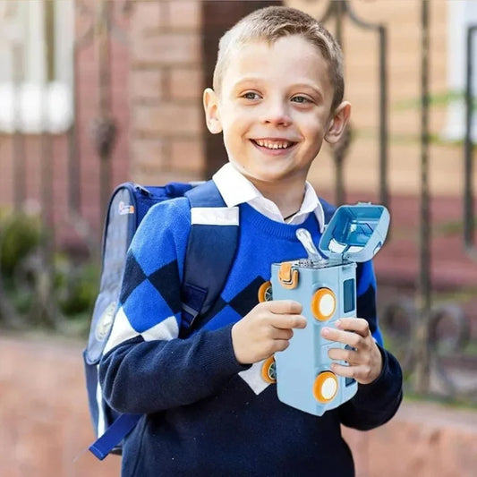 Hunt PK Child holding a toy device outdoors with a building in the background