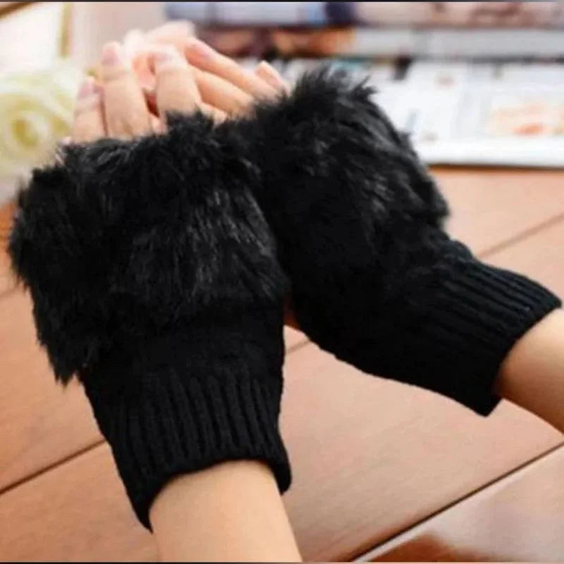Hunt PK Black knitted gloves with fluffy cuffs worn on a wooden surface