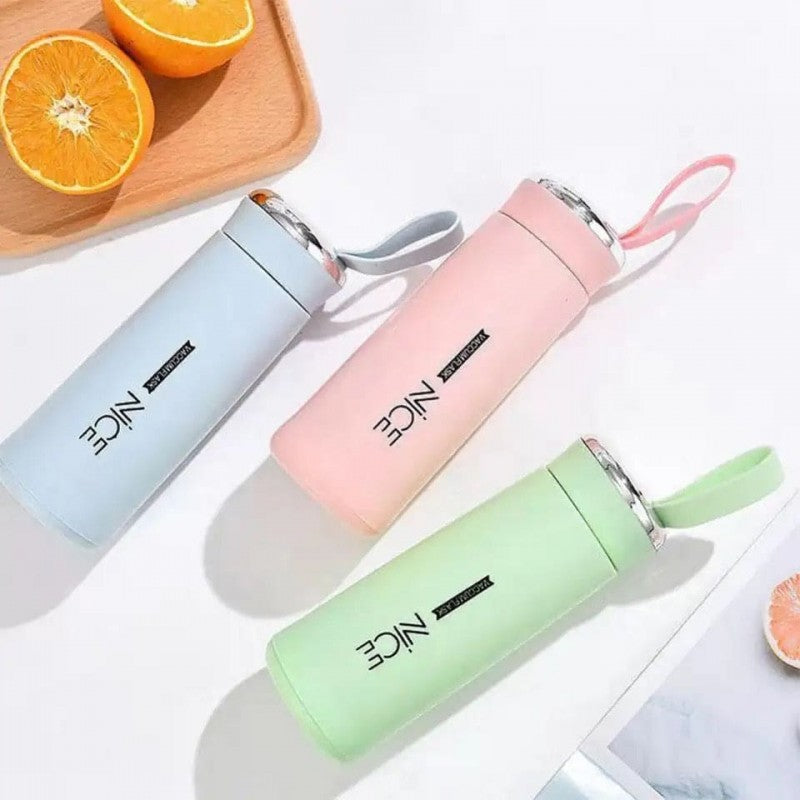 Hunt PK Three colorful water bottles on a white surface with oranges in the background